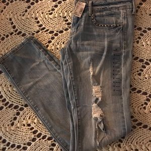 Distressed- size 8 light skinny jeans